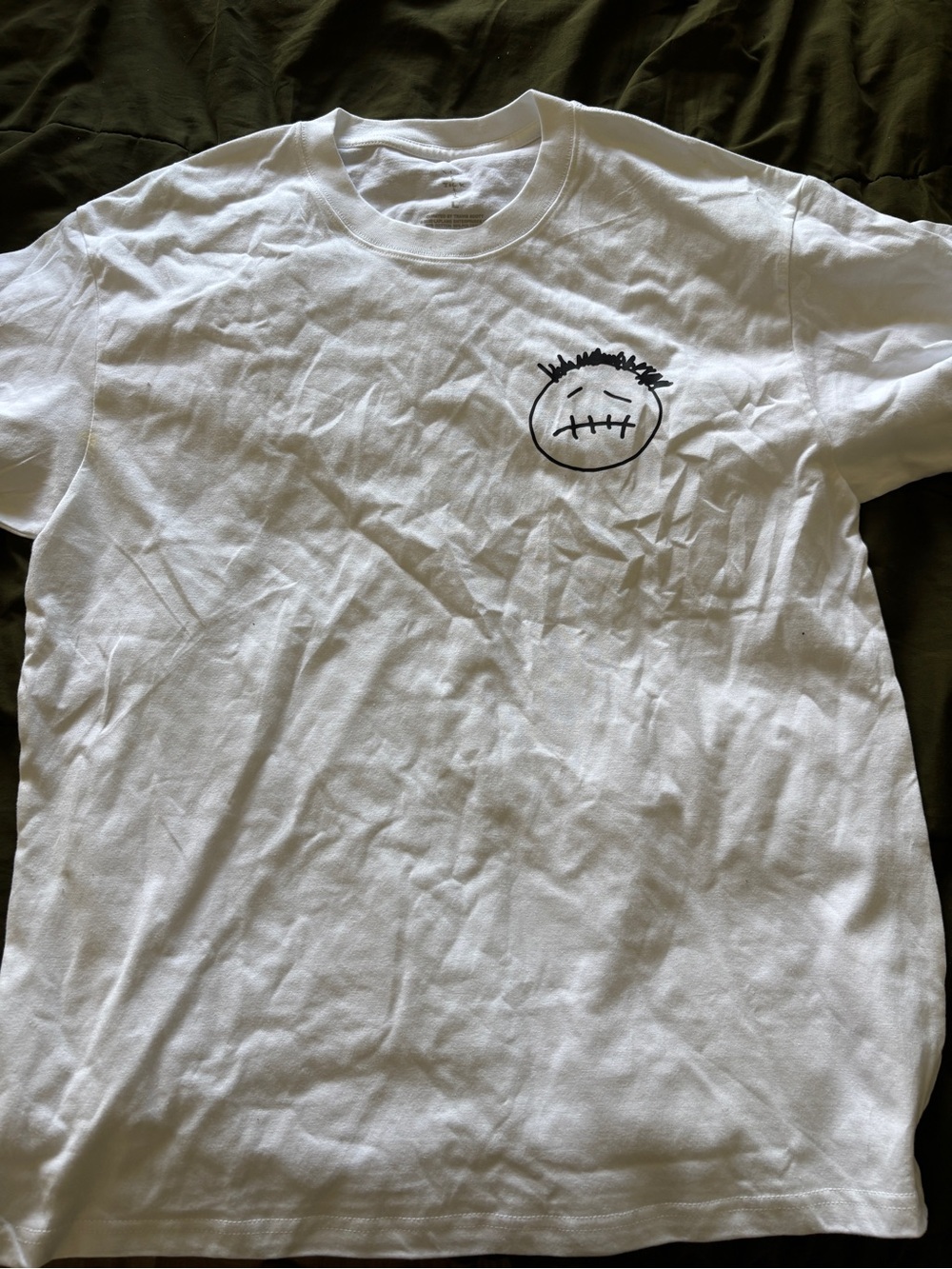 Travis Scott White Short Sleeve Tee with Small Black Face Graphic